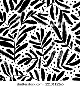 Branches with long rounded leaves seamless pattern. Hand drawn black brush botanical ornament with small dots. Hand drawn vector eucalyptus, olive or laurel twigs. Dry brush style floral motives.