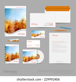 Brand identity company style template demonstrated on mobile devices office supplies and stationery for businesses with polygonal background