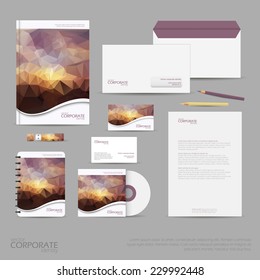 Brand identity company style template demonstrated on mobile devices office supplies and stationery for businesses with polygonal background