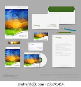 Brand identity company style template demonstrated on mobile devices office supplies and stationery for businesses with polygonal background