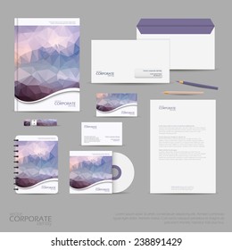 Brand identity company style template demonstrated on mobile devices office supplies and stationery for businesses with polygonal background