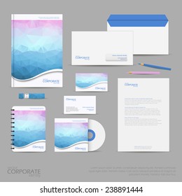 Brand identity company style template demonstrated on mobile devices office supplies and stationery for businesses with polygonal background