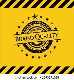 Brand Quality grunge black emblem with yellow background, warning sign. Vector Illustration. Detailed.