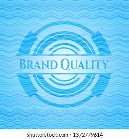 Brand Quality light blue water wave style emblem.