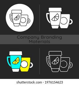 Branded cup and thermal cup dark theme icon. Unique stylish conteiner for drinking hot liquids. Uniquely created items. Linear white, simple glyph and RGB color styles. Isolated vector illustrations