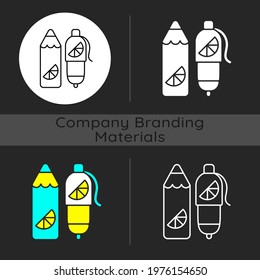 Branded pens and pencils dark theme icon. Advertising company with use of office equipment. Printing on items. Linear white, simple glyph and RGB color styles. Isolated vector illustrations