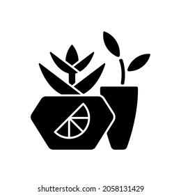 Branded plant pot black glyph icon. Unique place for growing plants and flowers. Designers create fashionable house decor items. Silhouette symbol on white space. Vector isolated illustration