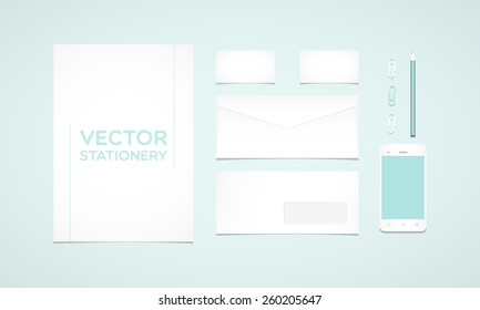 Branding identity template. Letterhead, envelope, business card, smartphone, pencil and paperclips. Flat design
