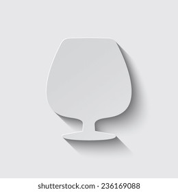 brandy glass with shadow on a grey background