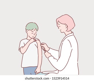 Brave young boy receiving an injection. Hand drawn style vector design illustrations.