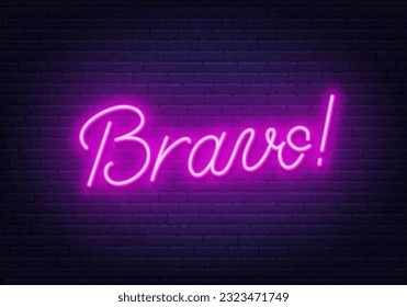 Bravo neon sign on brick wall background.