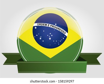 the brazil flag within a circle and a green ribbon