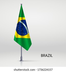 Brazil hanging flag on flagpole