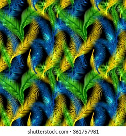 The Brazilian background from feathers in the Brazilian ethnic color. Seamless pattern. Carnival background on the black.