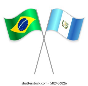 Brazilian and Guatemalan crossed flags. Brazil combined with Guatemala isolated on white. Language learning, international business or travel concept.