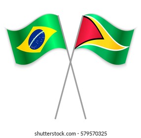 Brazilian and Guyanese crossed flags. Brazil combined with Guyana isolated on white. Language learning, international business or travel concept.