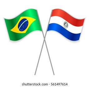 Brazilian and Paraguayan crossed flags. Brazil combined with Paraguay isolated on white. Language learning, international business or travel concept.