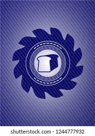 bread icon inside badge with denim background