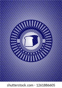 bread icon inside badge with denim texture