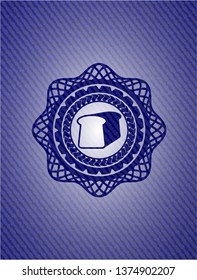 bread icon inside badge with denim texture