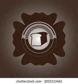 bread icon inside badge with wood background. 