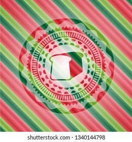 bread icon inside christmas badge.