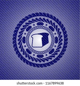 bread icon inside emblem with denim texture