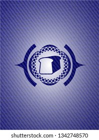 bread icon inside emblem with denim high quality background