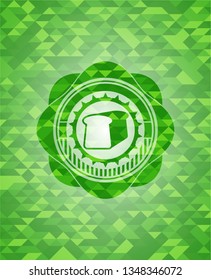 bread icon inside green emblem. Mosaic background