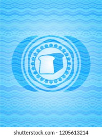 bread icon inside light blue water wave badge background.