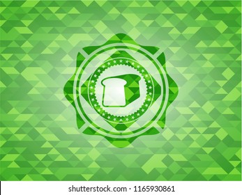 bread icon inside realistic green mosaic emblem