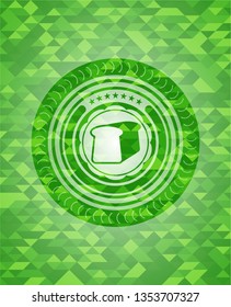 bread icon inside realistic green mosaic emblem