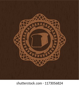 bread icon inside realistic wood emblem