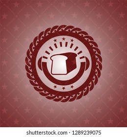 bread icon inside red emblem