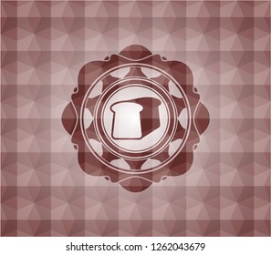 bread icon inside red seamless emblem with geometric pattern.