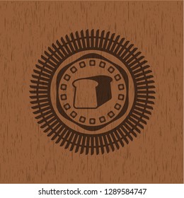 bread icon inside wooden emblem. Vintage.