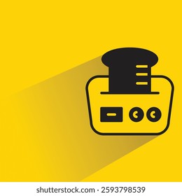 bread toaster icon with drop shadow on yellow background