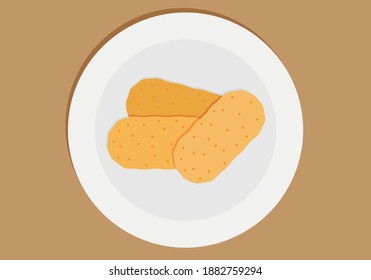 Breaded croquettes on a wooden table.