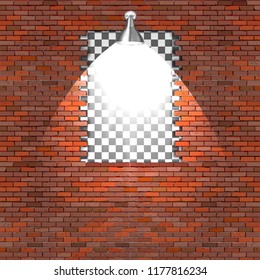 A break in a brick wall with a lighting lamp.