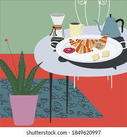The break fast table in colourful room.
