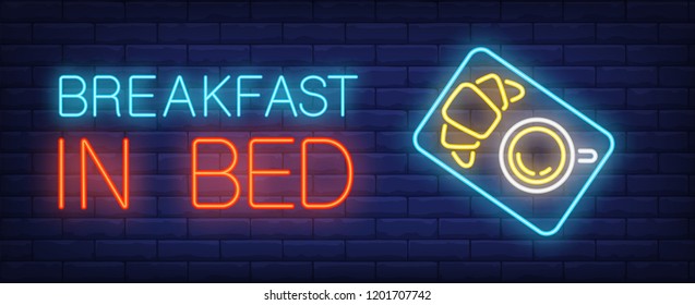 Breakfast in bed neon sign. Tray with coffee cup and croissant. Night bright advertisement. Vector illustration in neon style for hotel service, food delivery or cafe