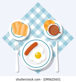 Breakfast concept. Appetizing delicious breakfast of coffee, fried egg with sausage, croissant and slices of toasted bread. Vector illustration flat design. Isolated on background checkered tablecloth