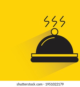 breakfast dish with shadow on yellow background