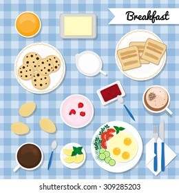 Breakfast with healthy, fresh food. Eggs, yogurt, juice, coffee macchiato, tea, toasts, jam jar, butter, milk, cookies..