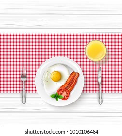 Breakfast menu with a fried egg and bacon on wooden table