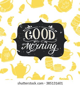 Breakfast seamless pattern with tea pots, pancakes, jam, eggs, croissants, and coffee. 'Good morning' hand lettering..