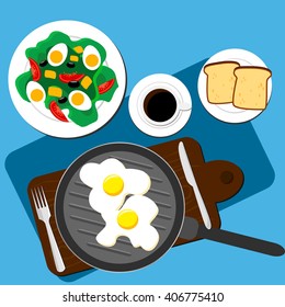 Breakfast at the table with a cup of coffee, eggs and salad