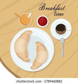 It's breakfast time. Two freshly baked croissants on a plate, a mug of black coffee and strawberries waiting. Delicious and healthy food, healthy eating concept.