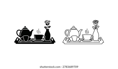 Breakfast tray with tea and croissant