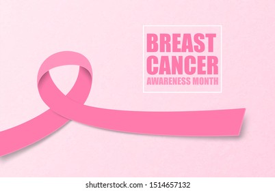 Breast cancer awareness month background concept in paper cut style. Vector illustration design for banner, poster, backdrop, wallpaper.